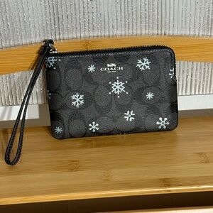 COACH Black Leather Zip Wristlet with Silver Hardware